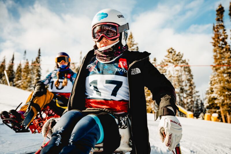 A sit-skier in bib 17 at the start of an NSCD race